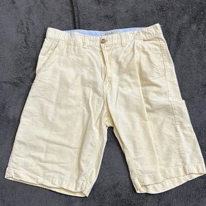Pale yellow shorts. Size 34